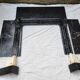 Pompadour fireplace with black marble modillions