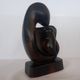 Wooden Sculpture of a Woman with Her Child
