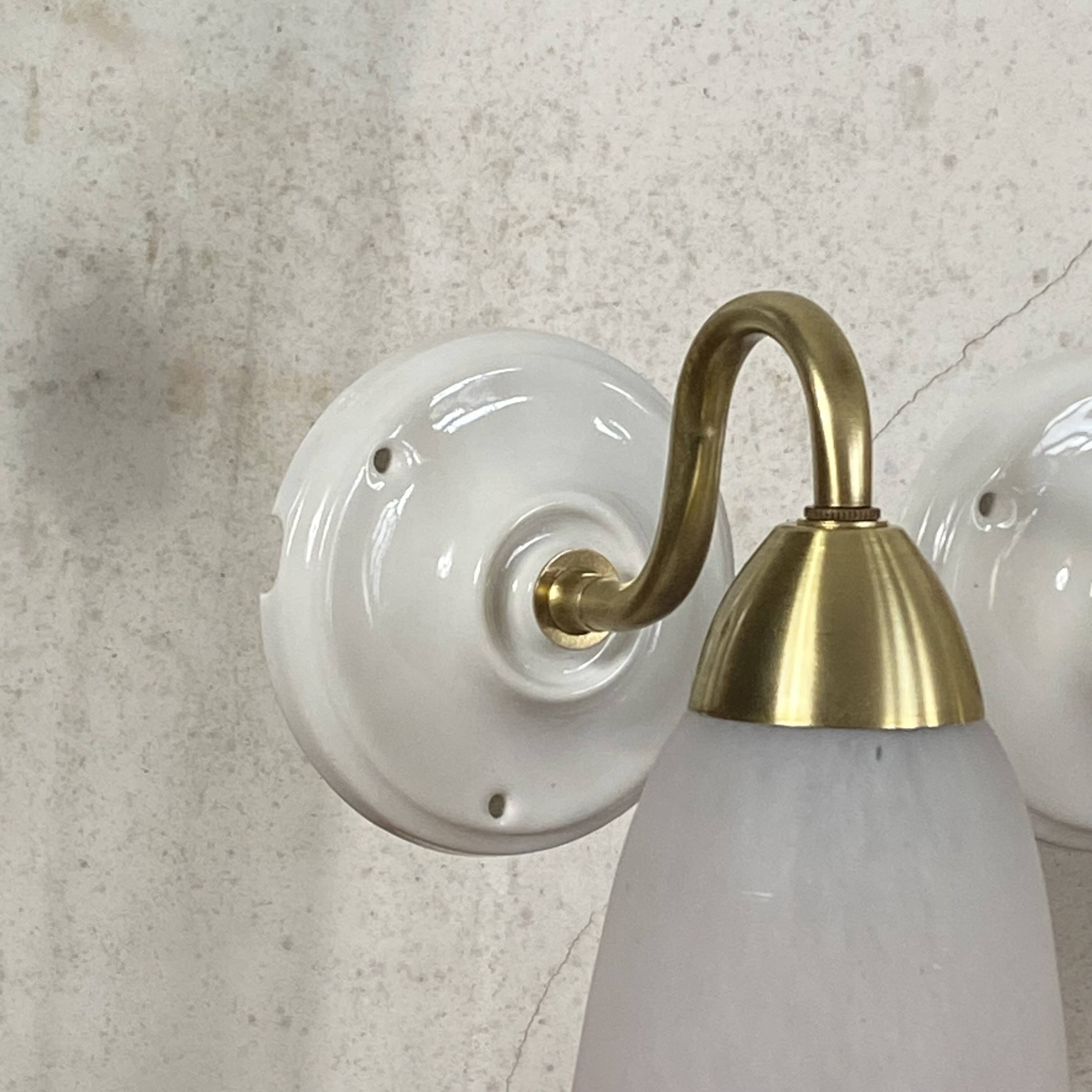 Pair of wall sconces in pink glass paste
