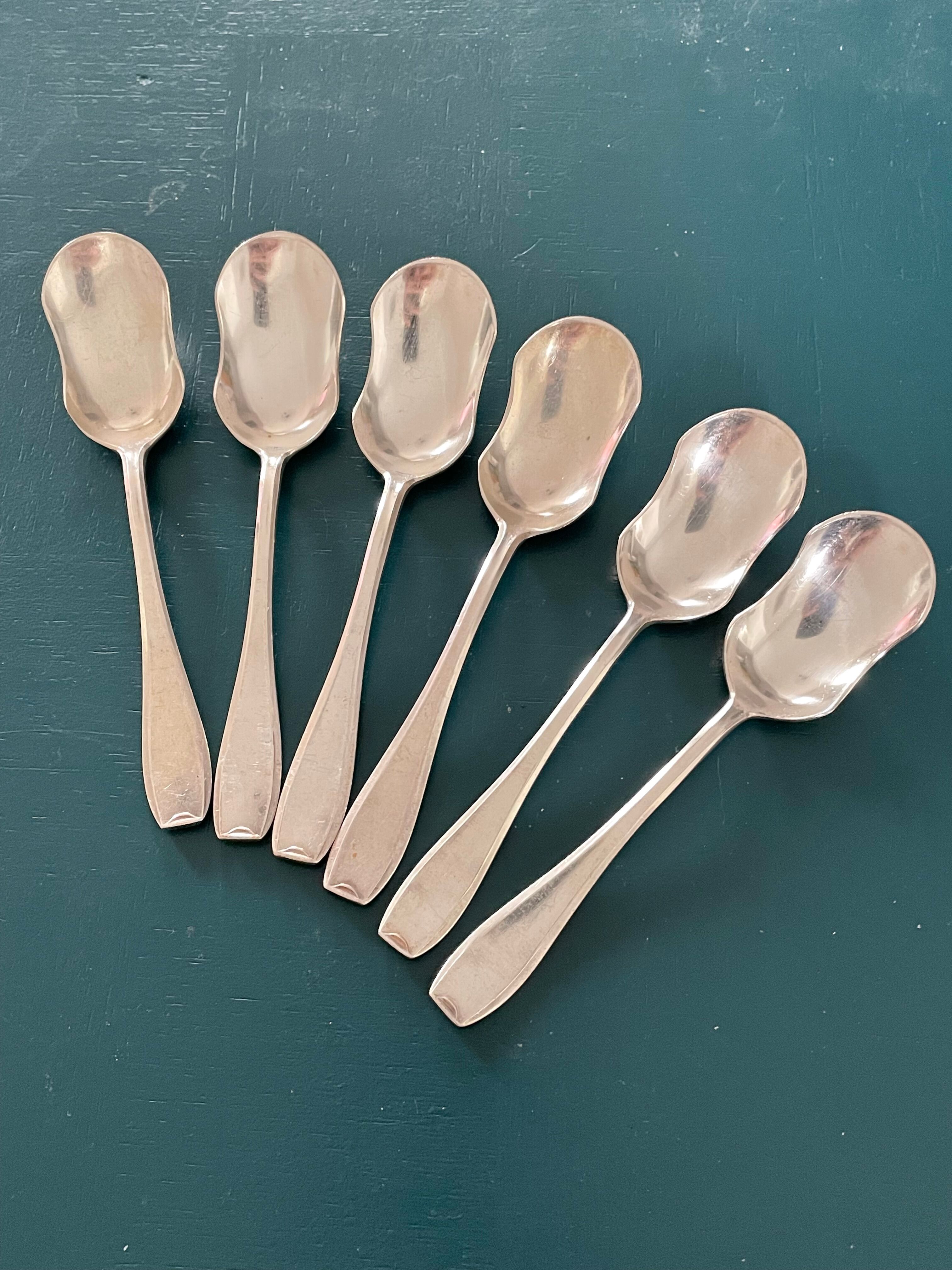 6 dessert spoons