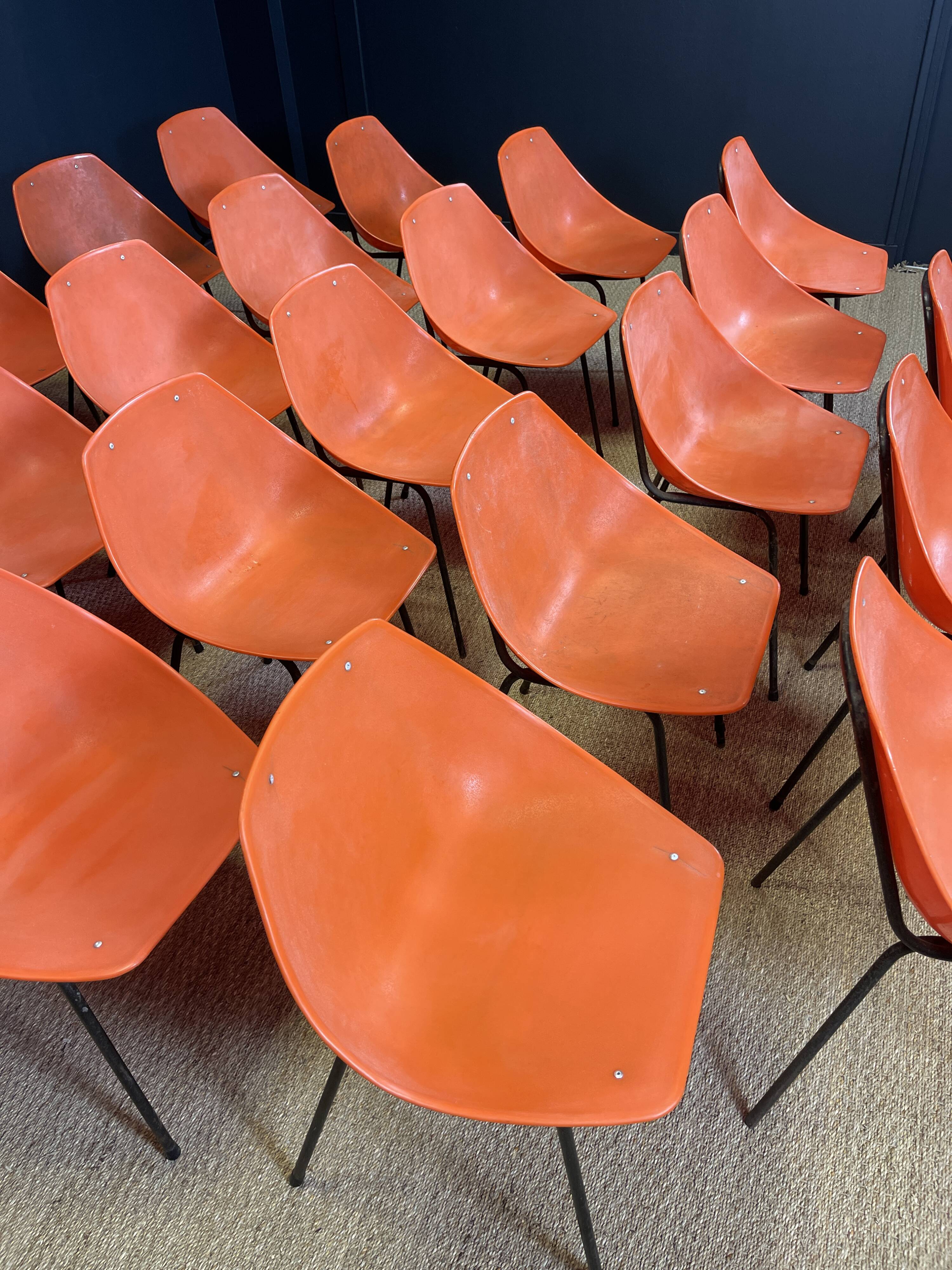Set of 24 orange Guariche chairs