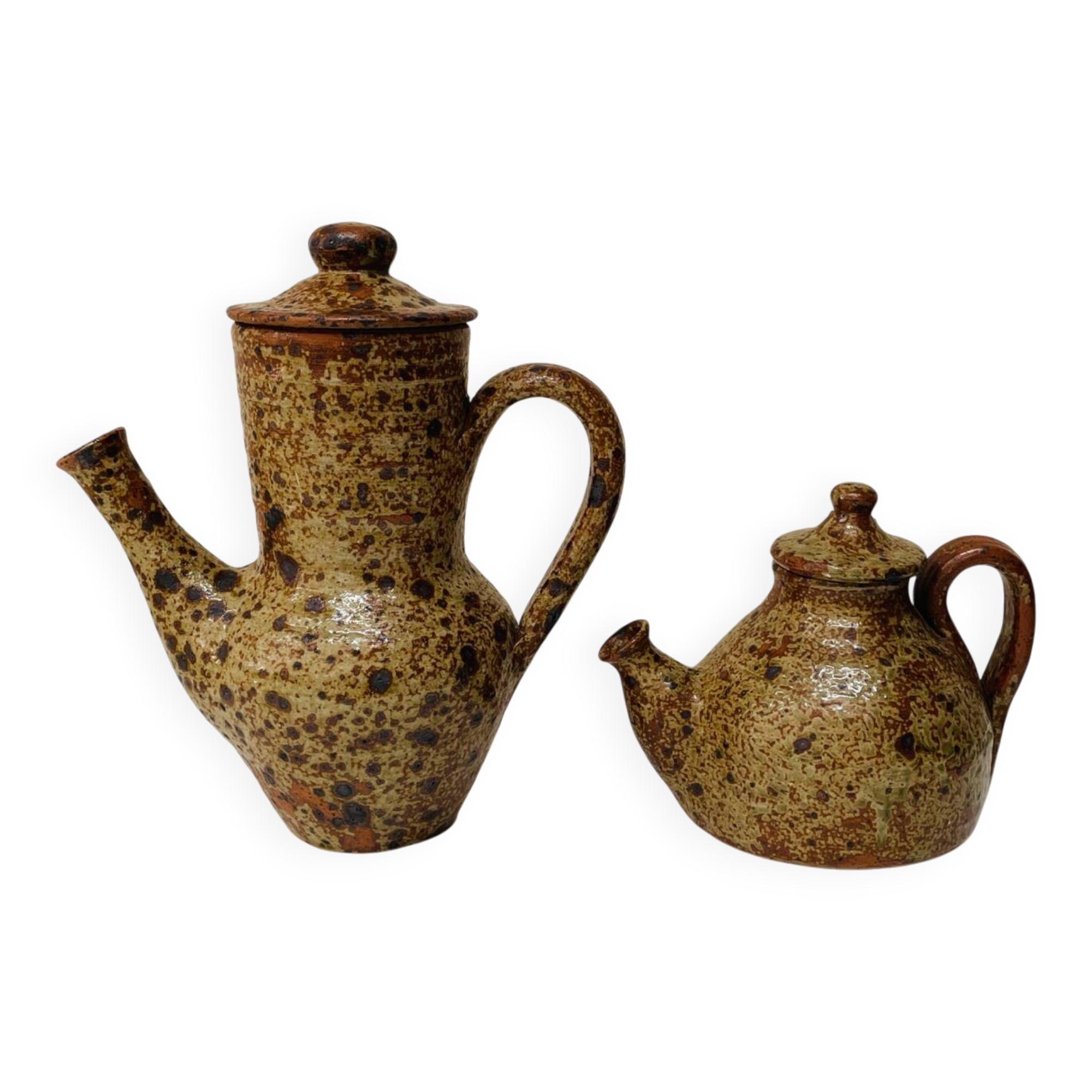Pair of vintage brutalist ceramic teapots from the 1970s.
