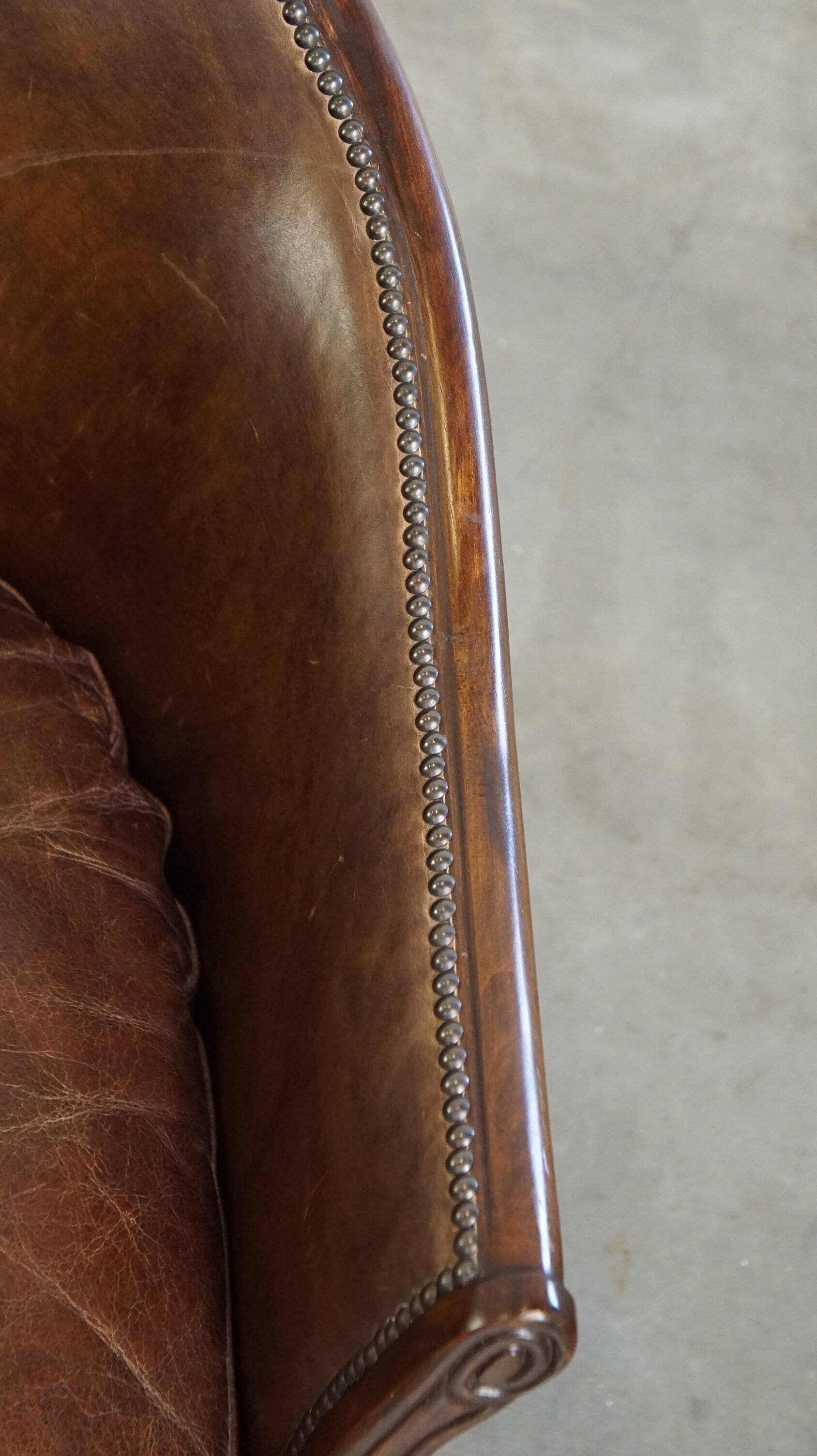 Set of 2 club chairs/armchairs in dark cognac leather