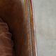 Set of 2 club chairs/armchairs in dark cognac leather