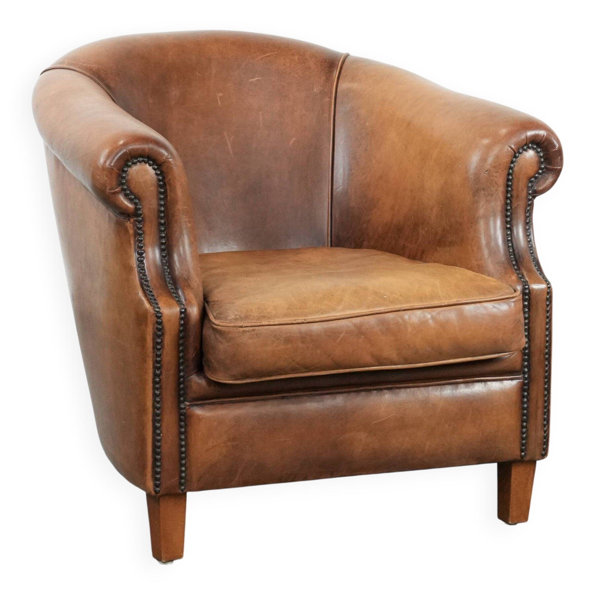 Comfortable club chair made of sheepskin leather