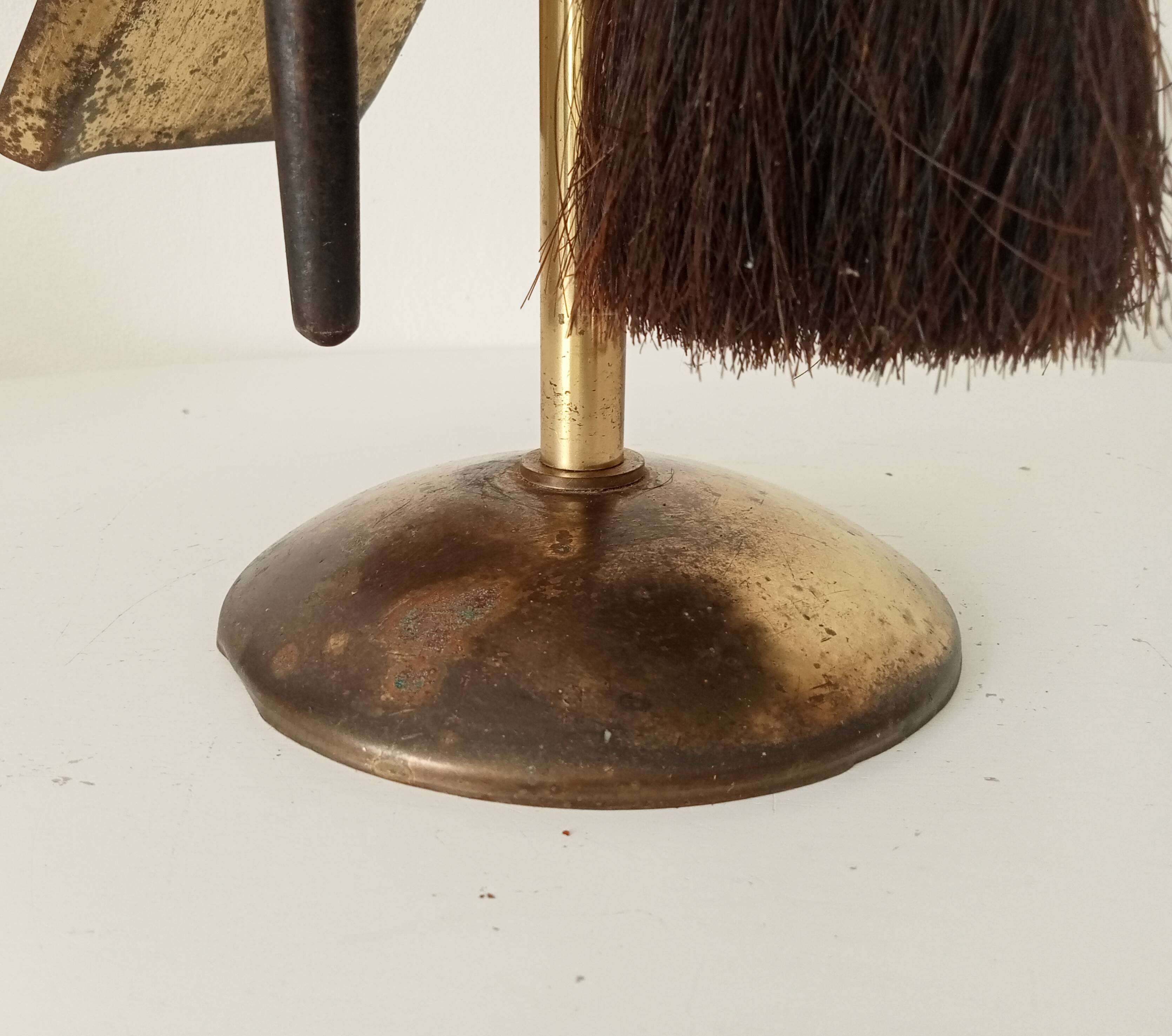 Old brass fireplace servant