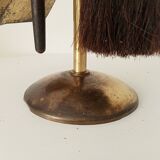 Old brass fireplace servant