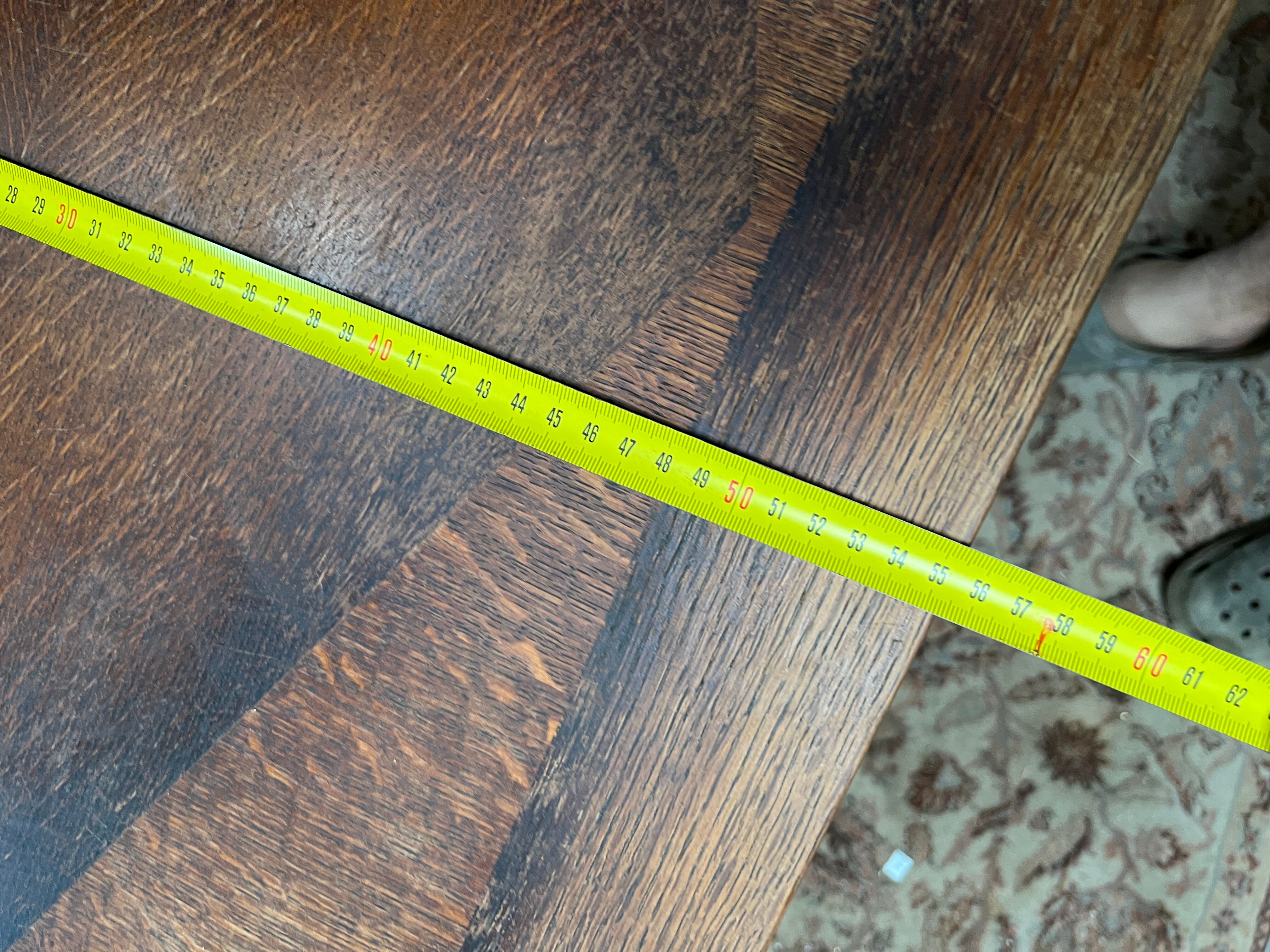 Spanish style table in carved wood and wrought iron