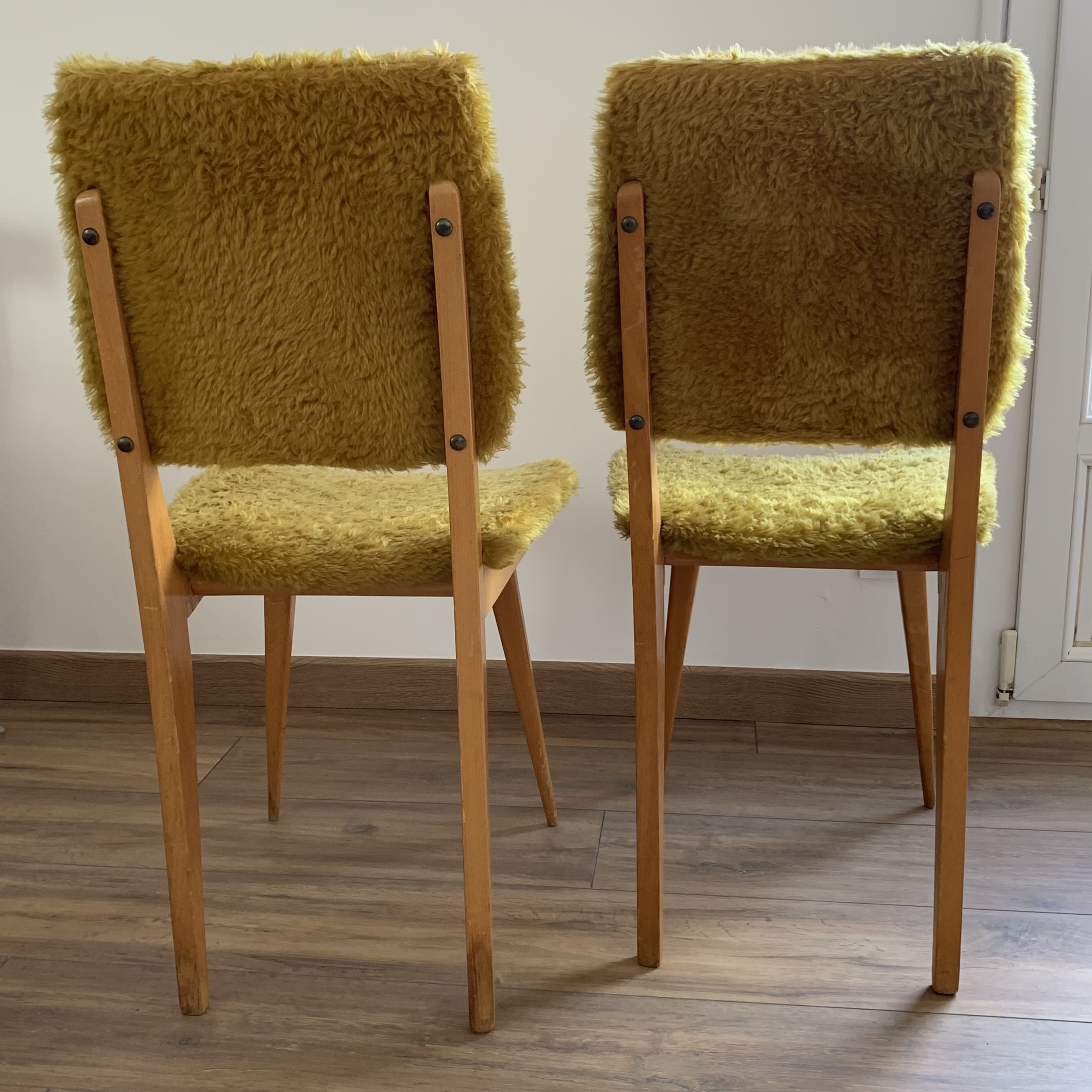 2 yellow moumoute chairs