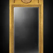 Golden trumeau mirror in Louis XVI style