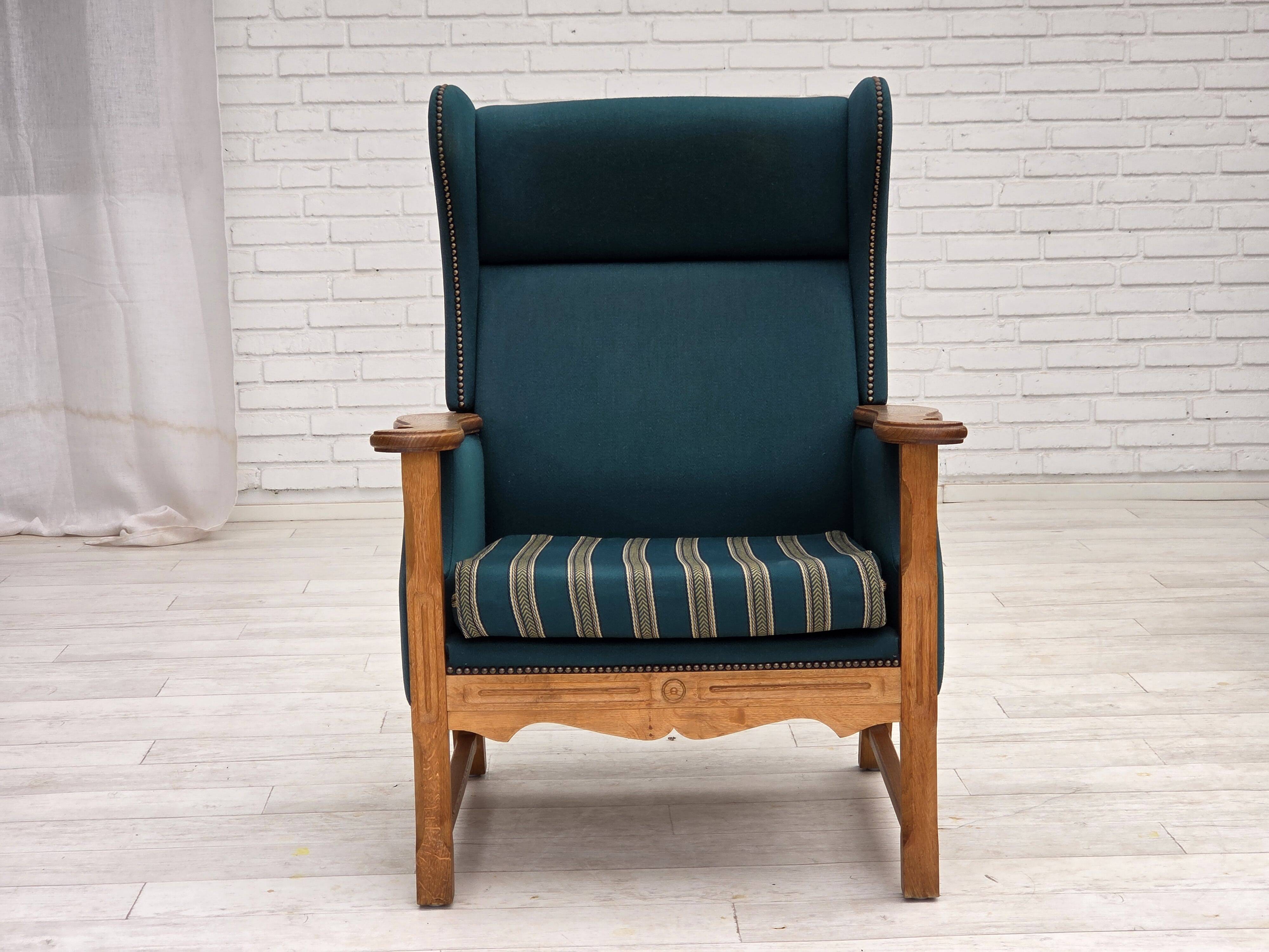 1970s, Danish highback armchair, furniture wool, solid oak wood.