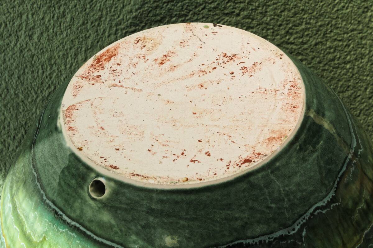 Glazed ceramic ball lamp base, green gradients.