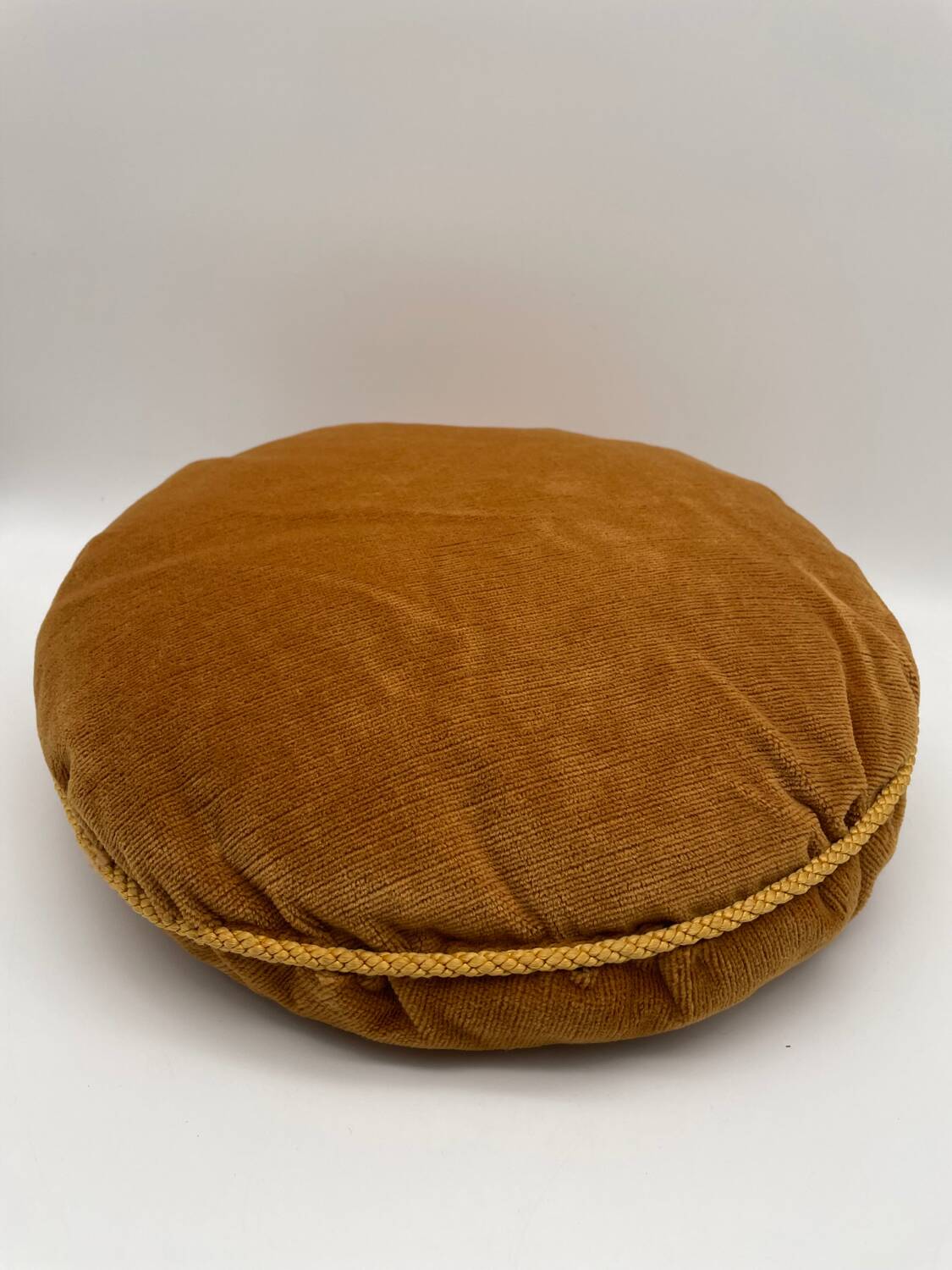 Pair of vintage round velvet cushions