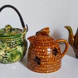Set of old teapots and honey pot