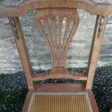 Pair of old chairs with brass elements