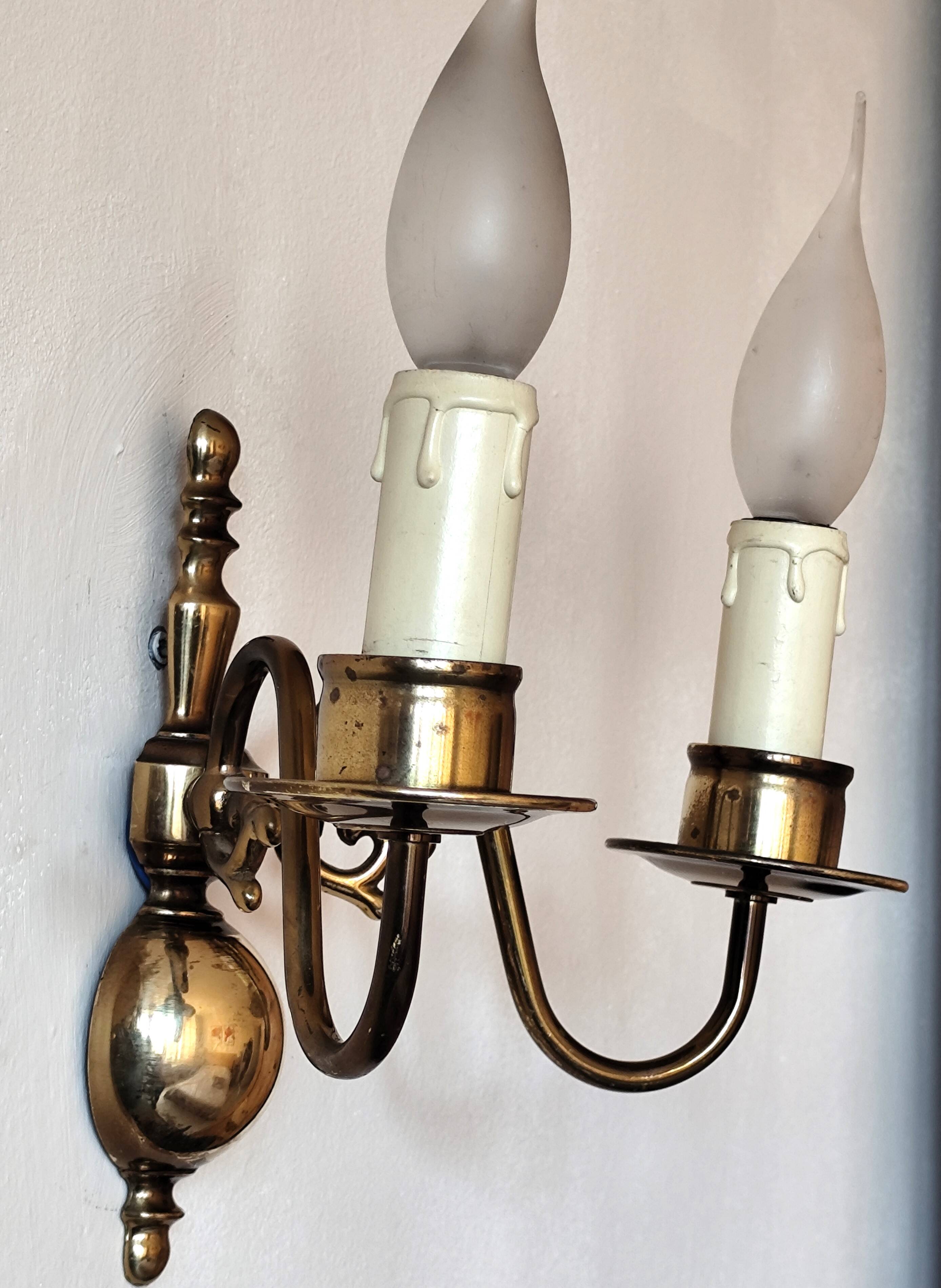 Pair of Dutch style 2-light brass wall lights