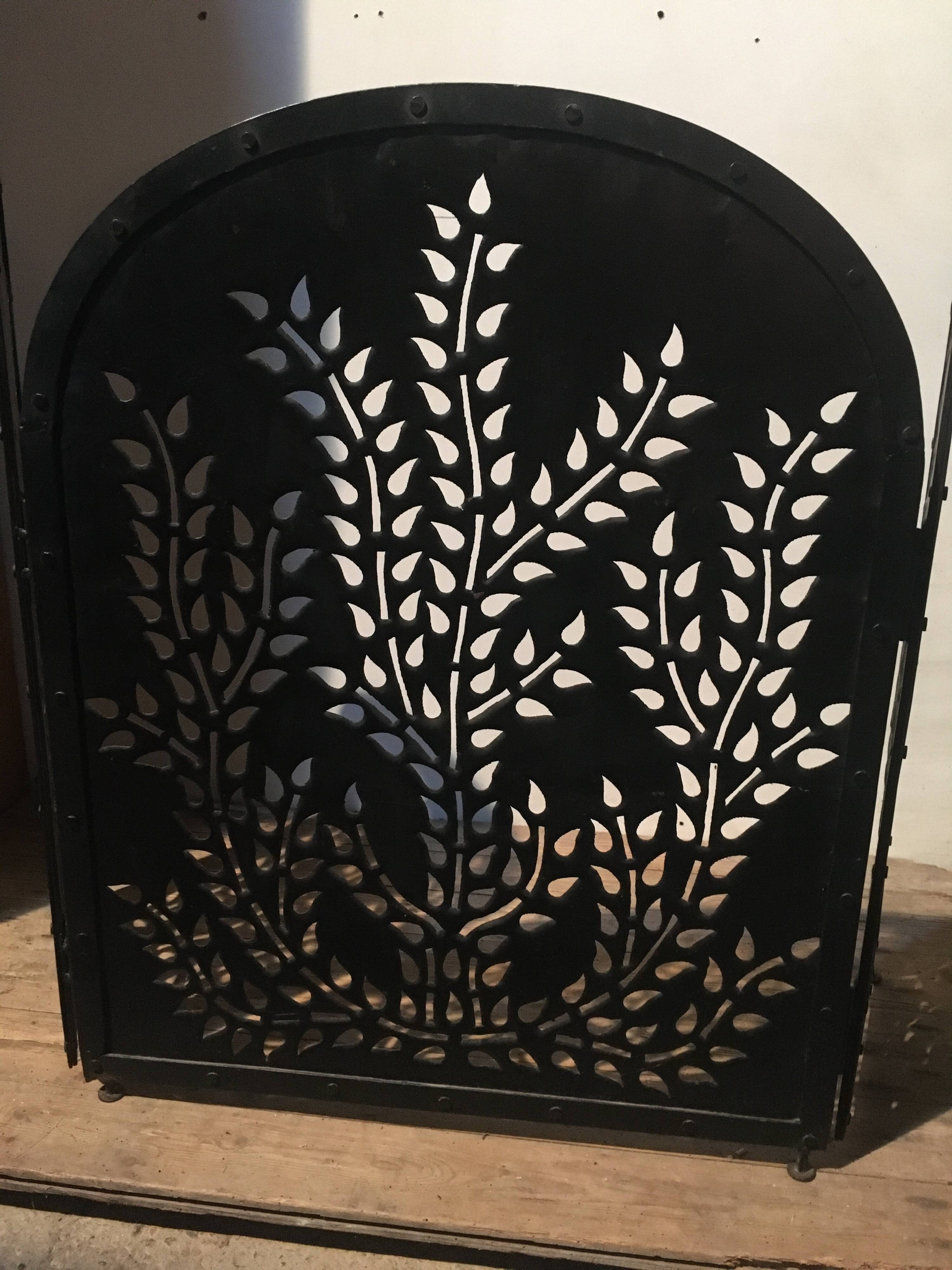 Wrought and cut metal fire screen