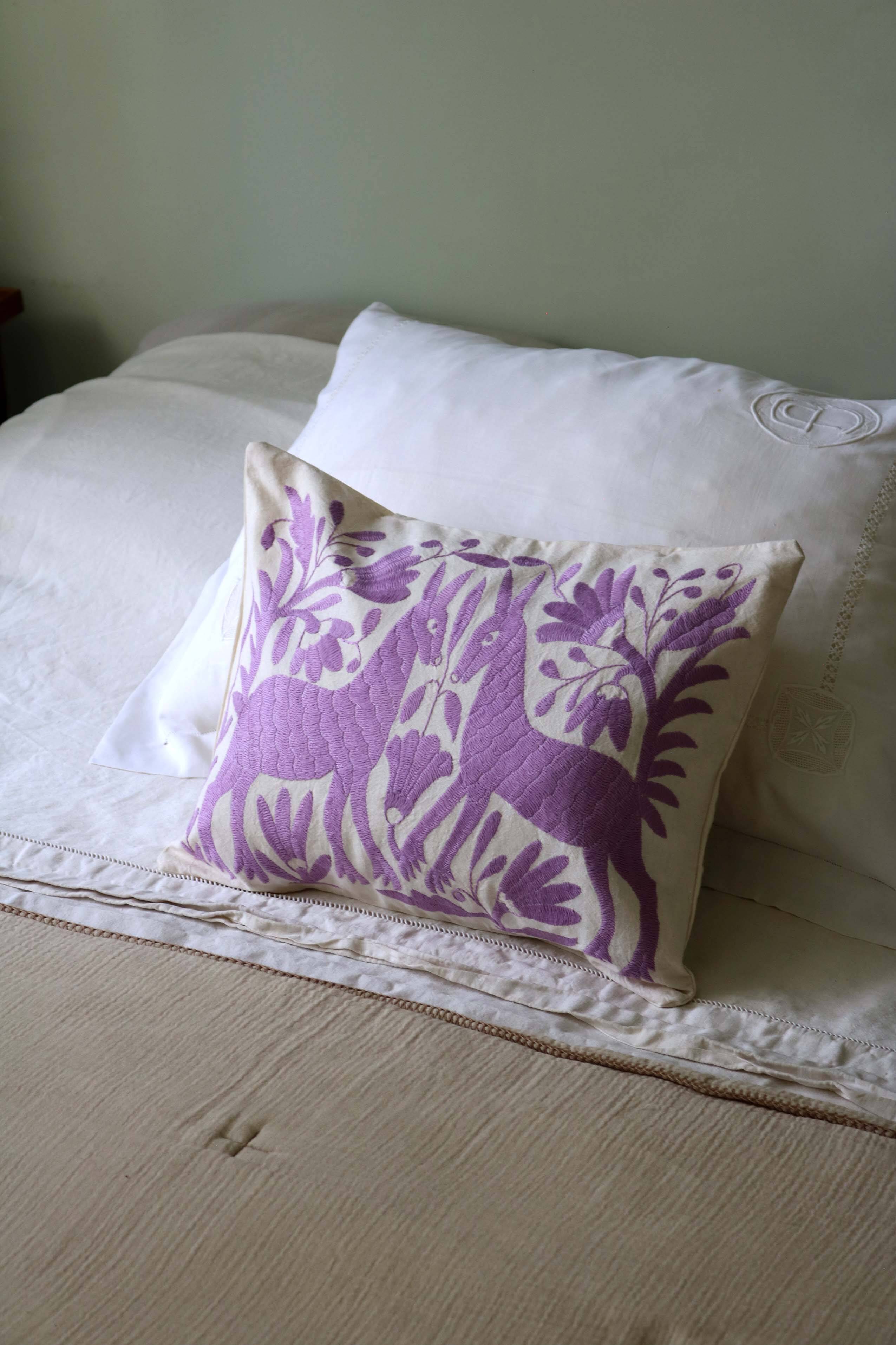 Hand-embroidered cushion