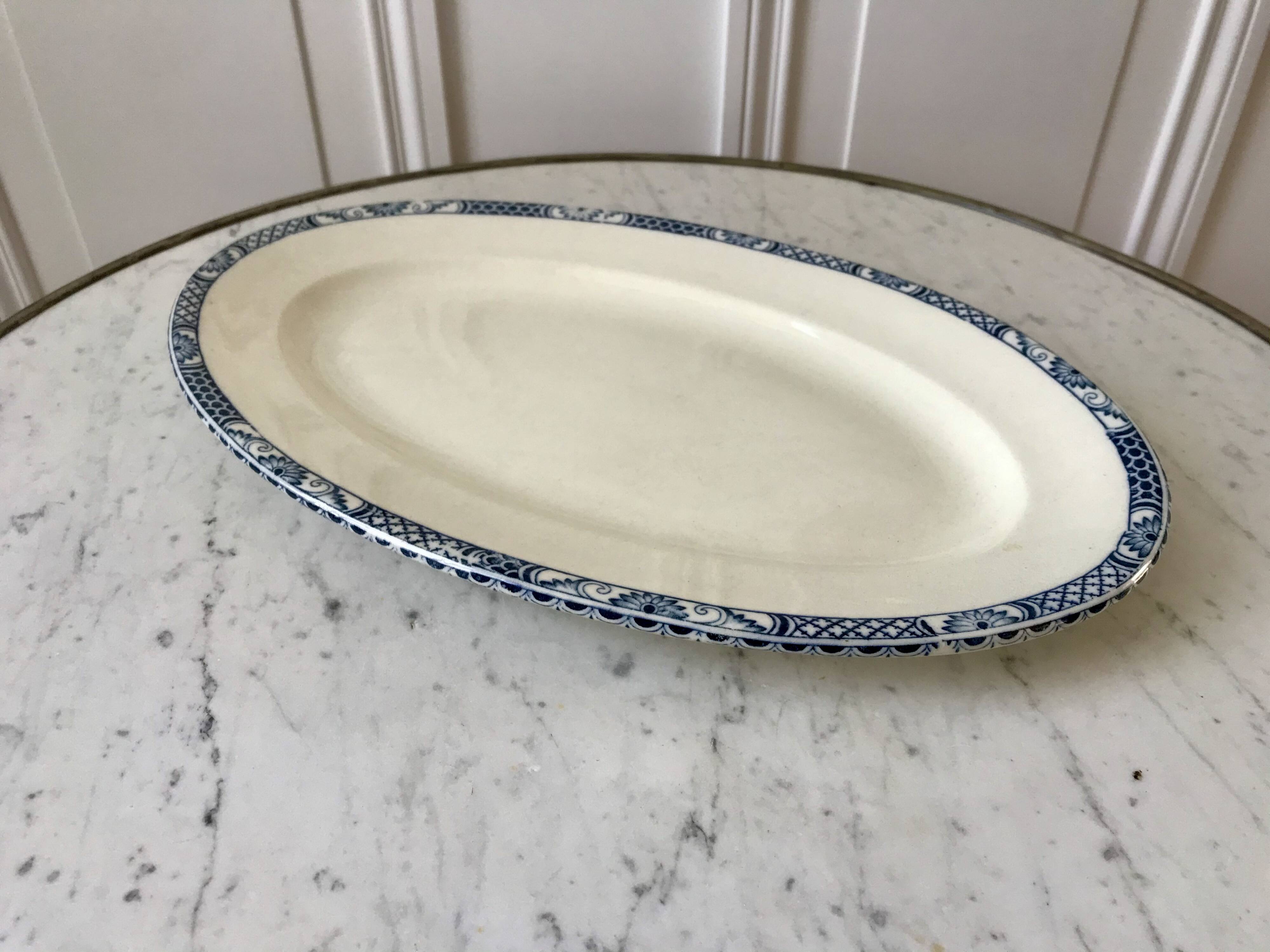Oval dish in terre de fer bleu xixth