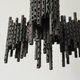 Three-armed suspended lamp in wrought iron, brutalist design, 1960s, Italy.