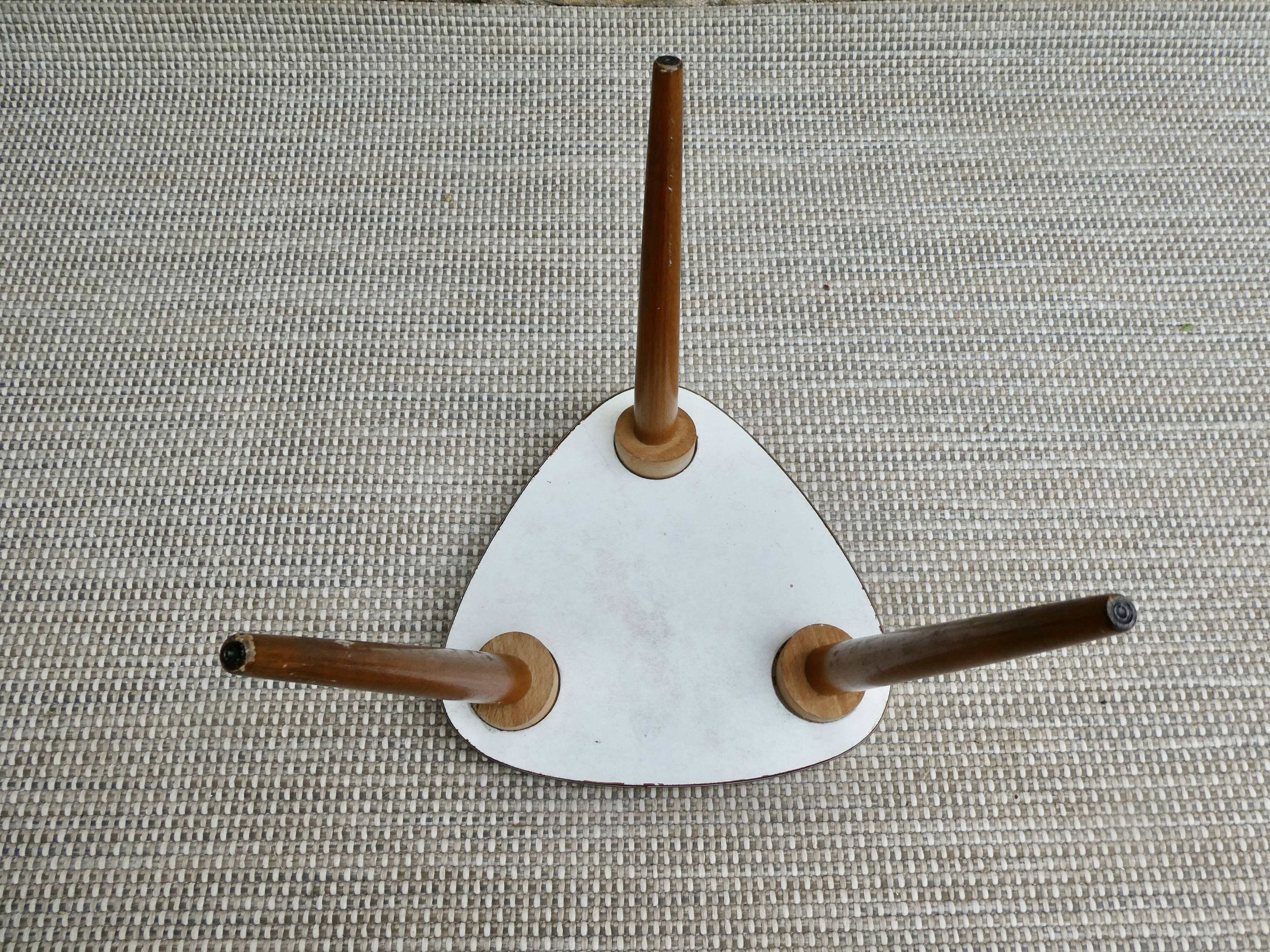 Wooden tripod plant holder and Formica imitating marble, 60s