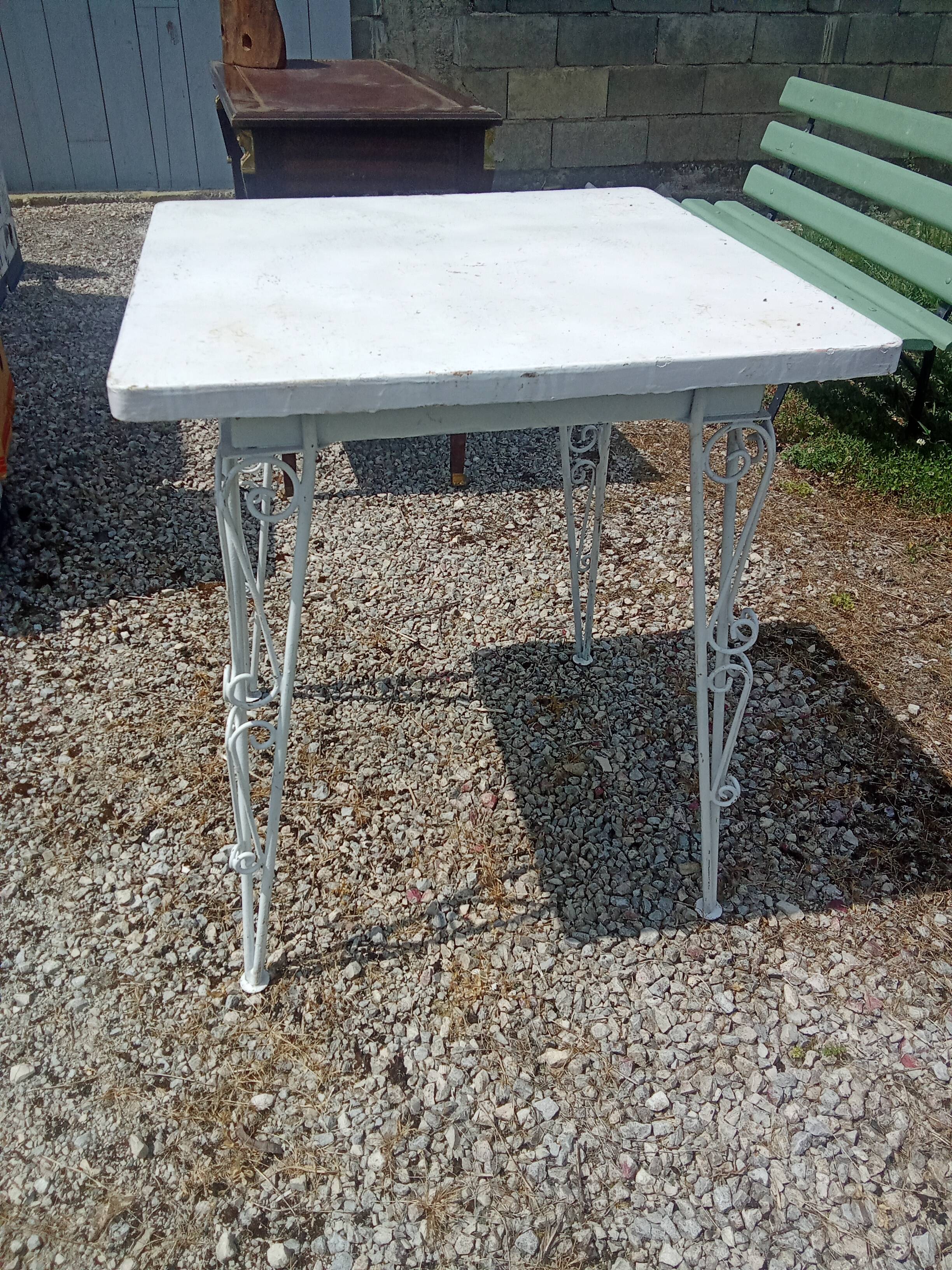 Wrought iron bistro table.