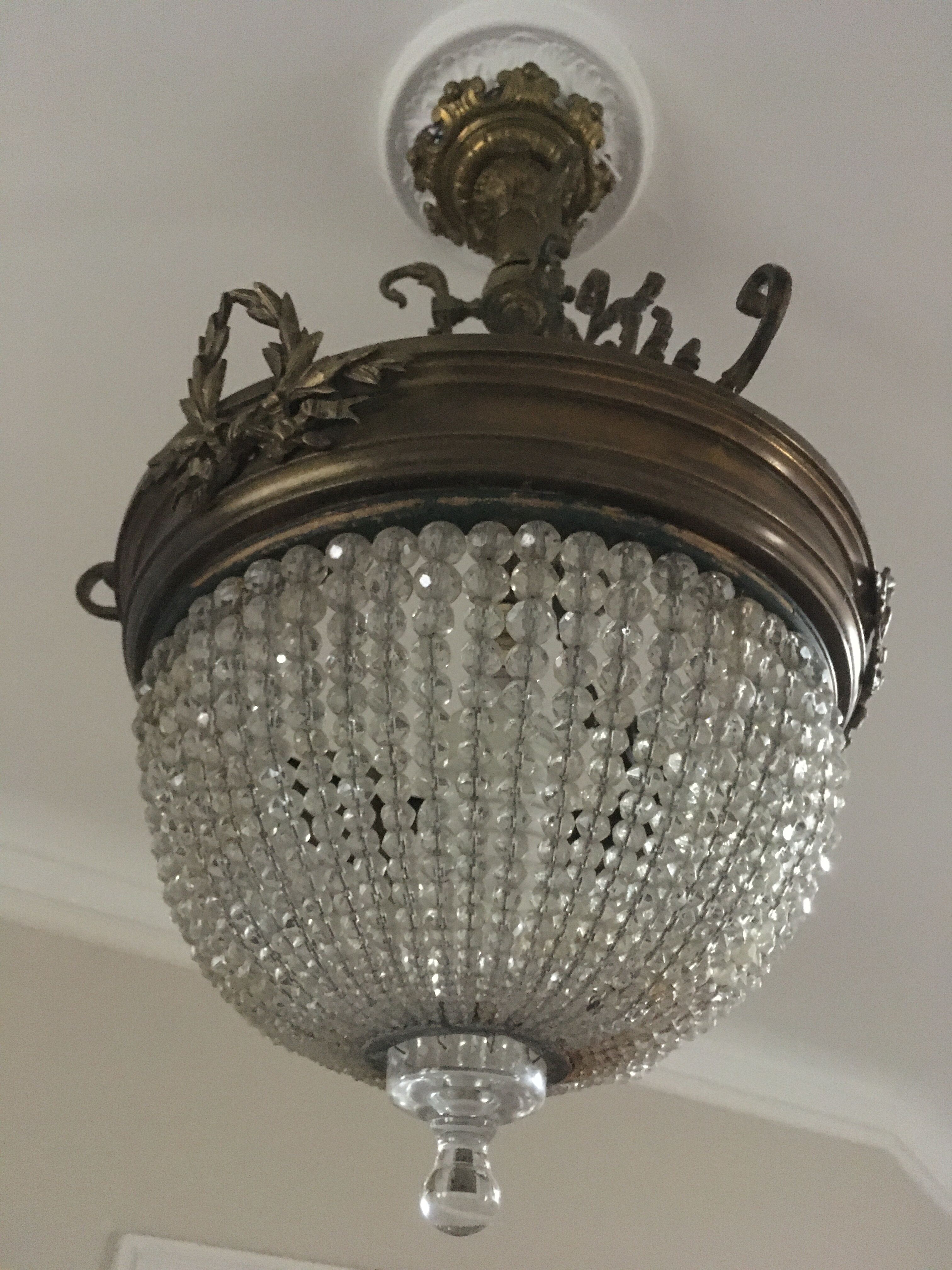 Bronze basket chandelier and tassels