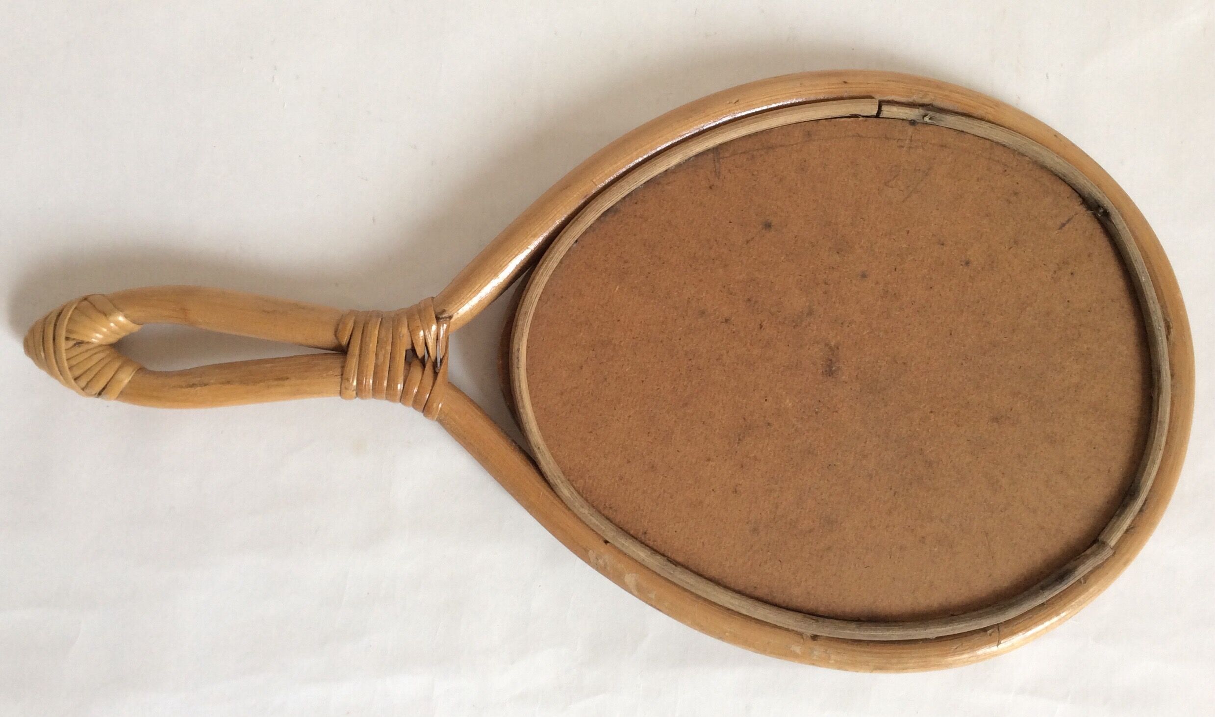 Mirror in rattan, face to hand  36x24cm