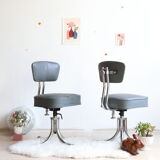 Pair of workshop chairs from the 50s in chrome steel and imitation leather