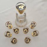 Liqueur service, 1 carafe & 6 small glasses, golden floral decoration.