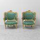 Pair of Louis XV style gilded armchairs with vintage green fabric