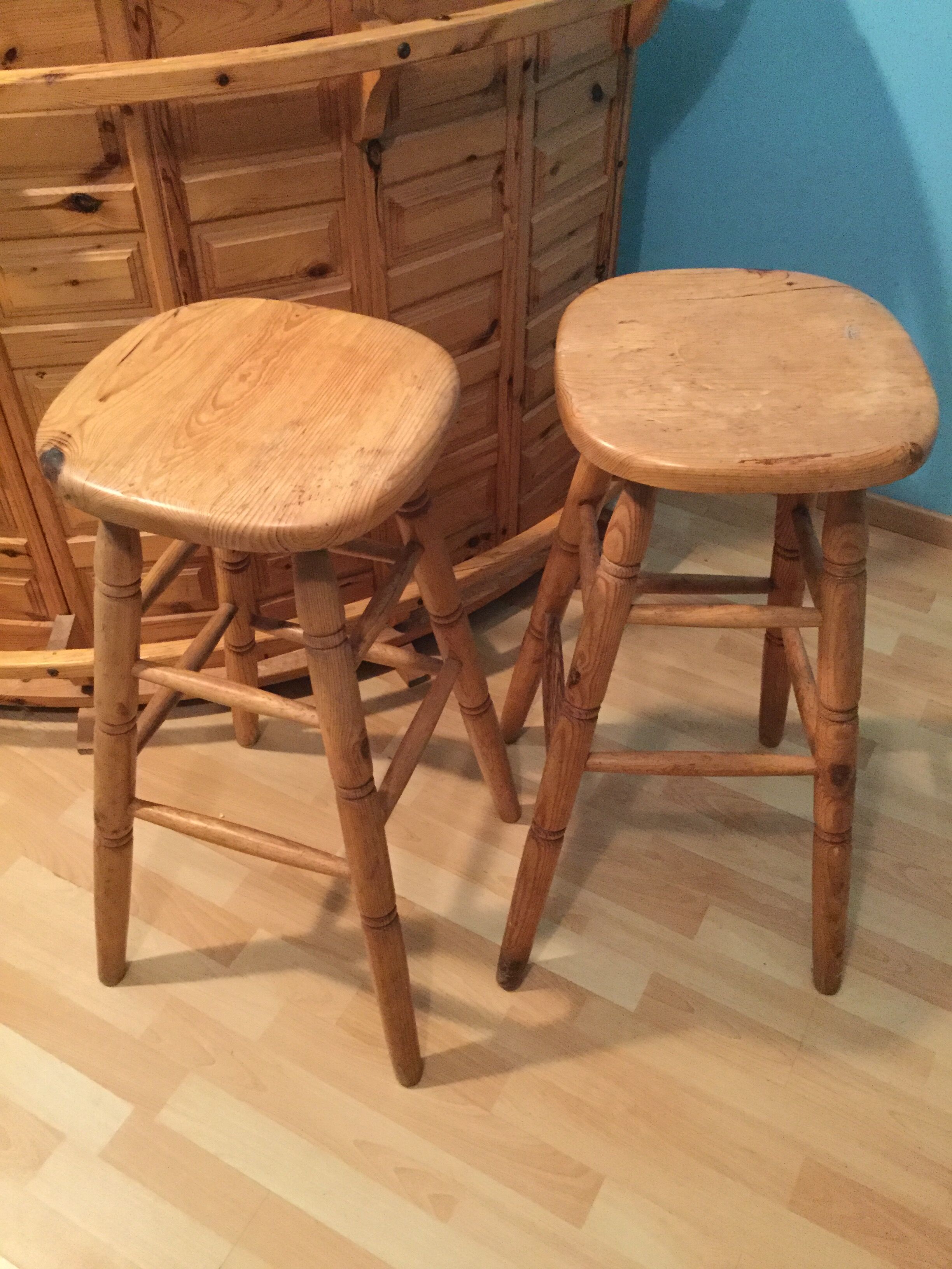 Vintage bar counter with natural wood stools