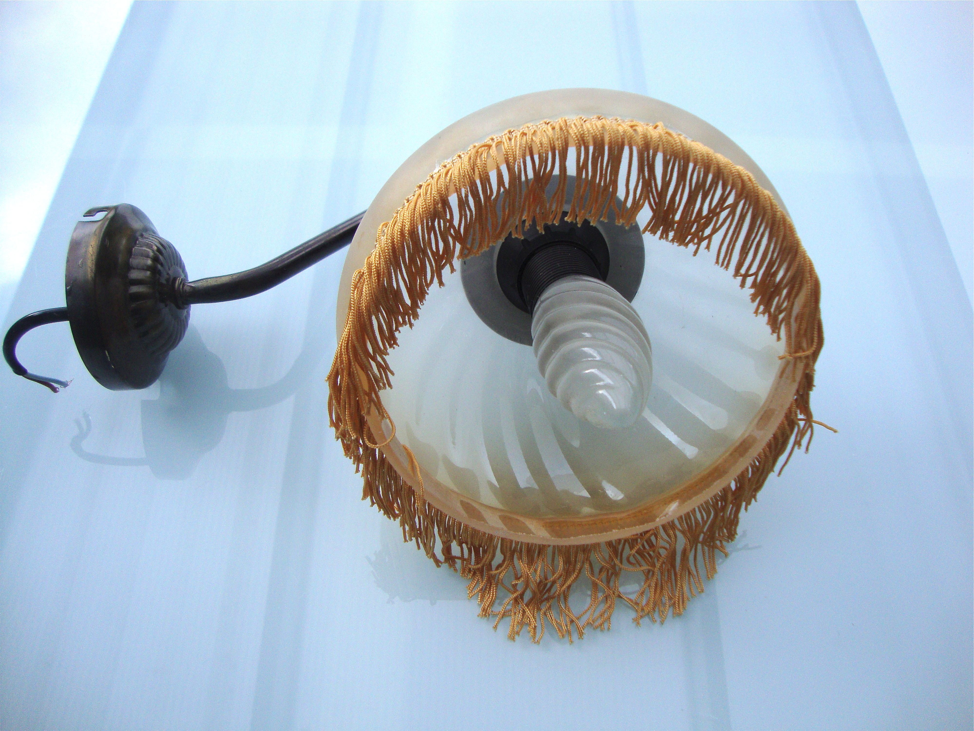 Fringed sconce