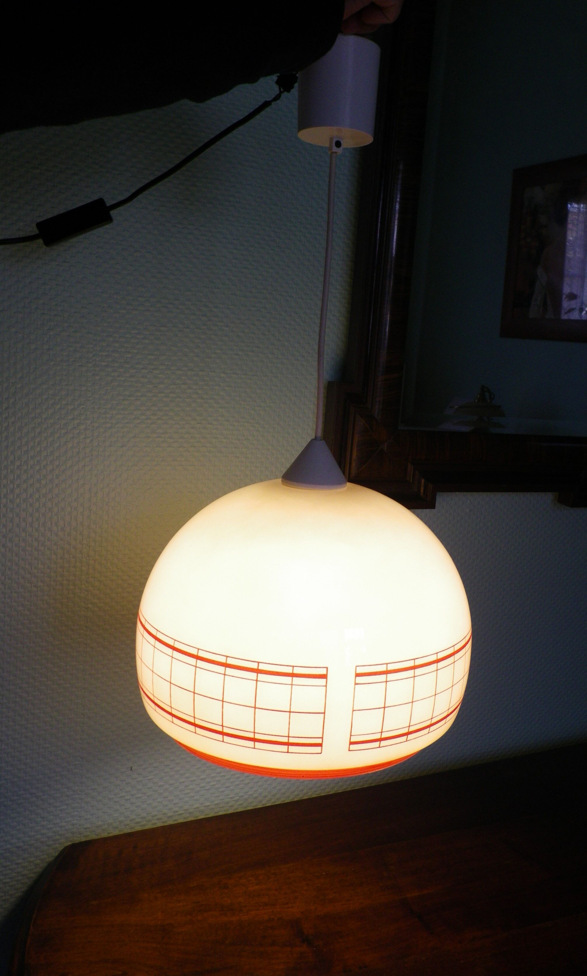 Space age pendant lamp, white opaline with orange silkscreened geometric designs