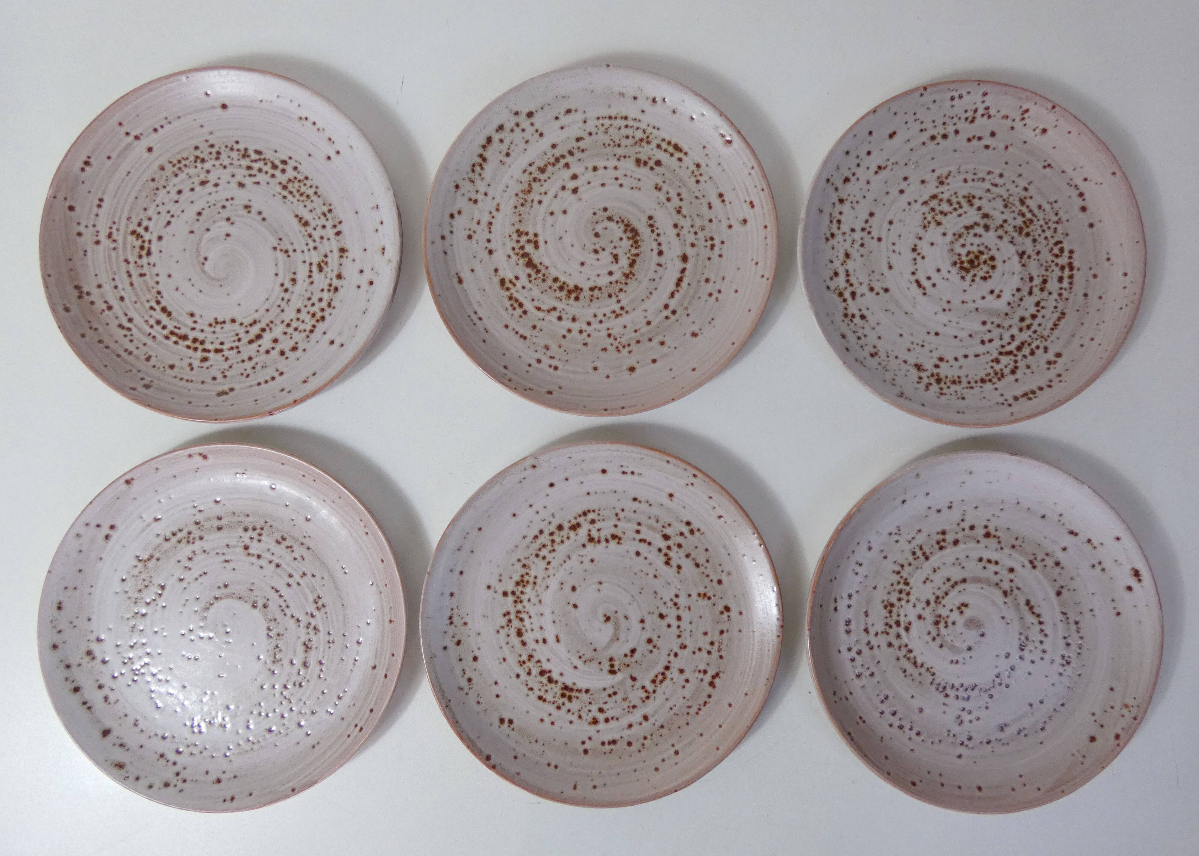6 signed stoneware dinner plates