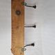 Wall rack "bistro" in metal and wood, 1900, 3 hooks
