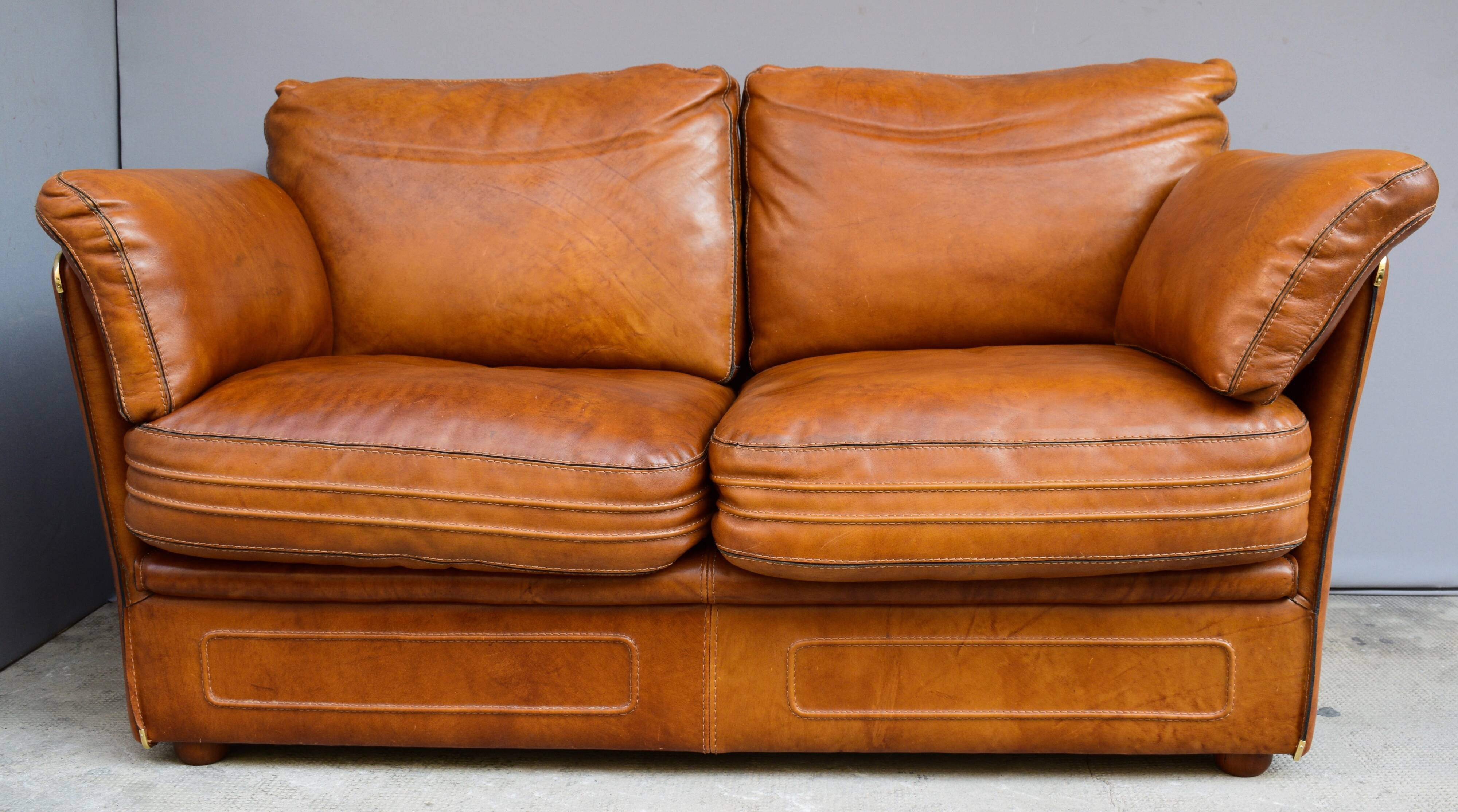 Vintage two-seater leather sofa