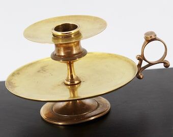 Brass hand candle holder
