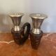 Pair of bronze candlesticks by Chapman