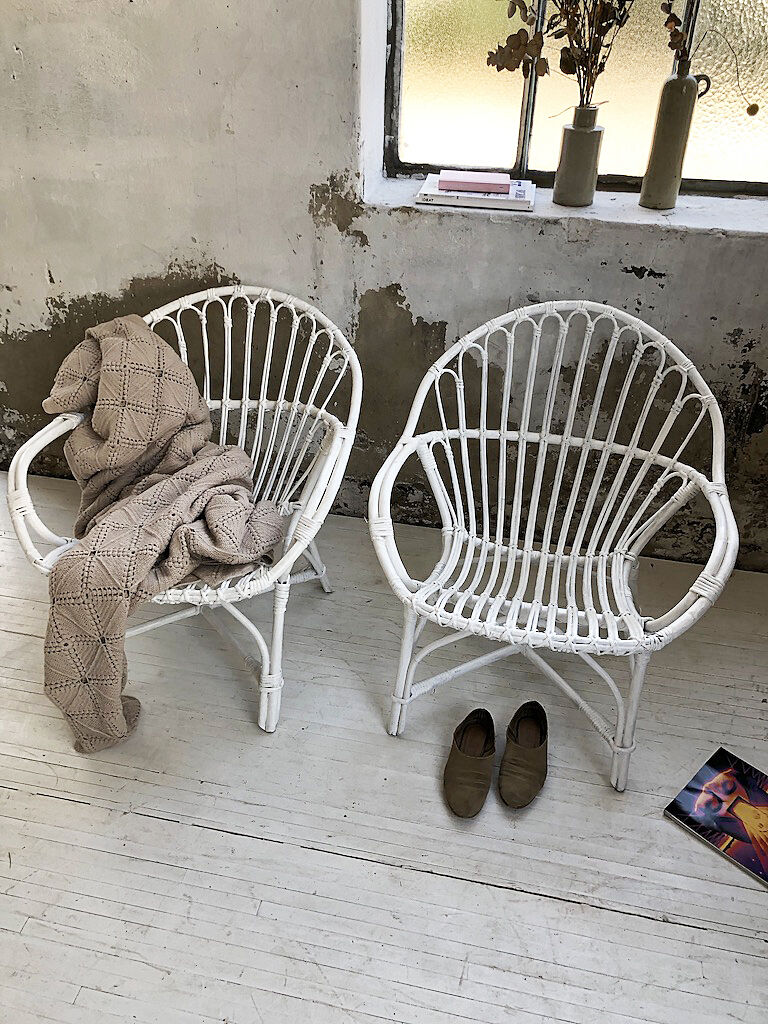 Pair of white rotin armchairs