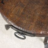 Brutalist round table in wrought iron and wood