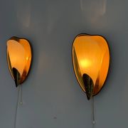 Pair of brass and glass wall lights from the mid-century, 1950s, Germany.