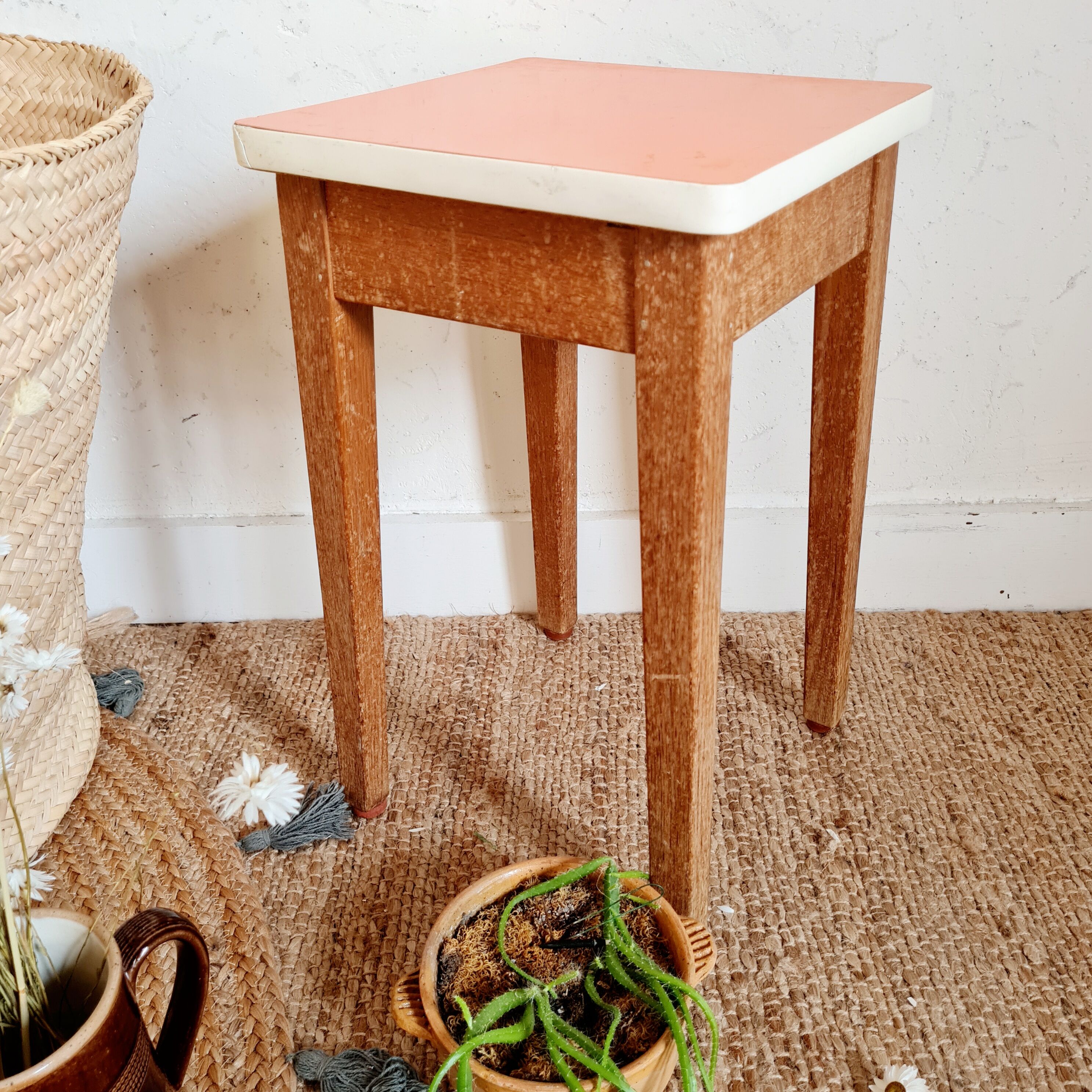 Wooden wax stool and orange formica