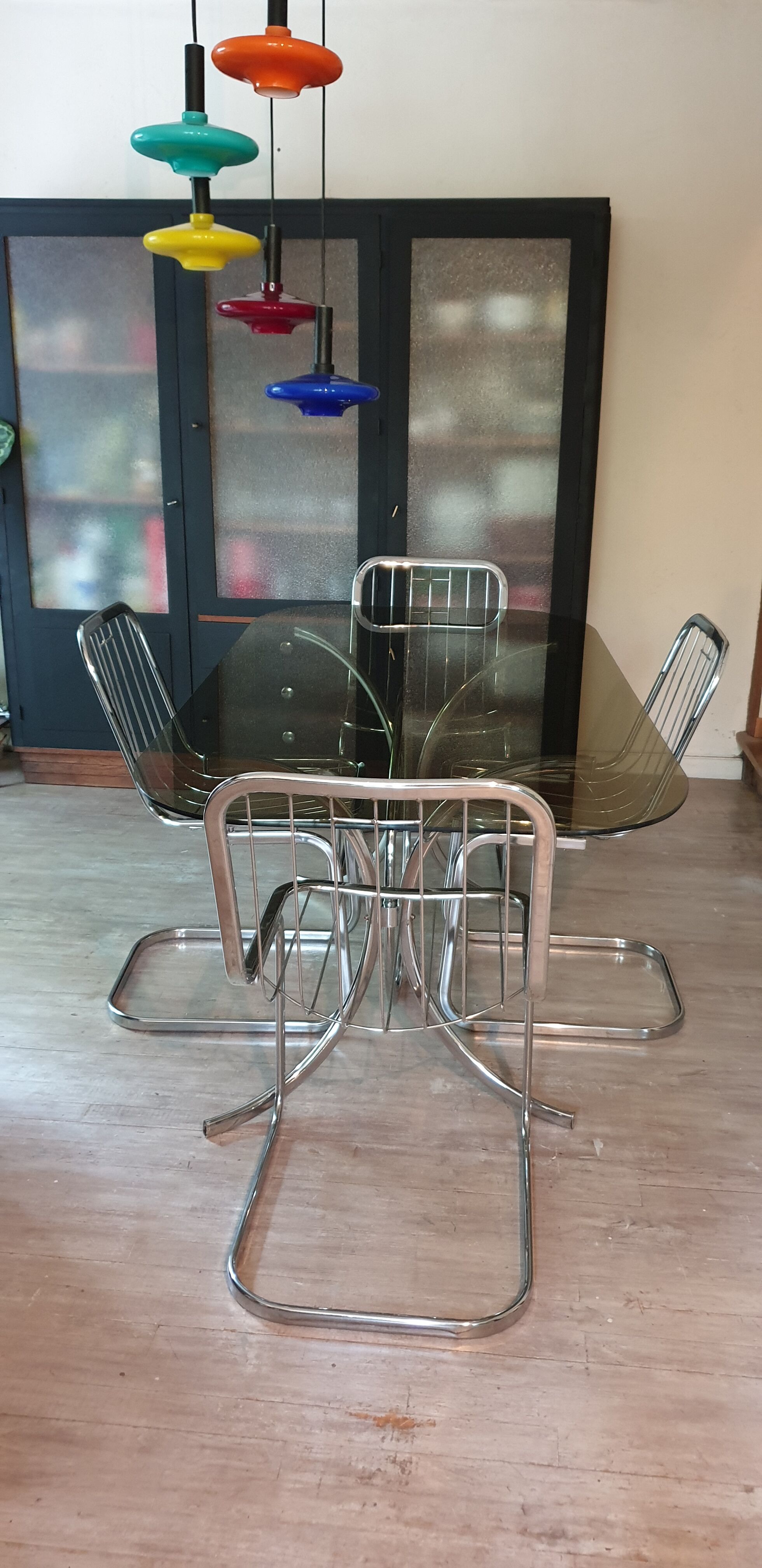 Table and four chrome chairs