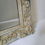 Ancient mirror carved entourage