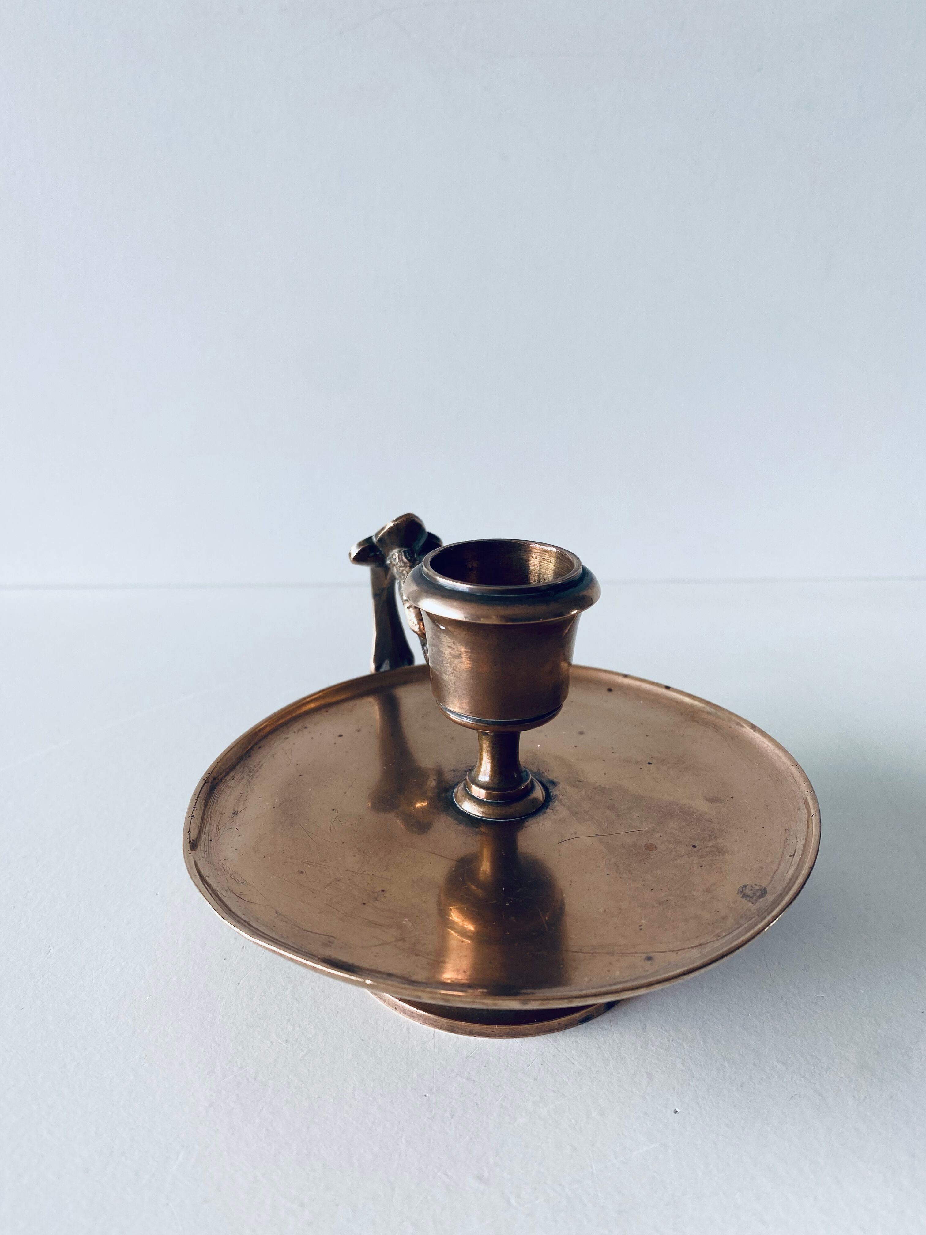 Eagle head candle holder