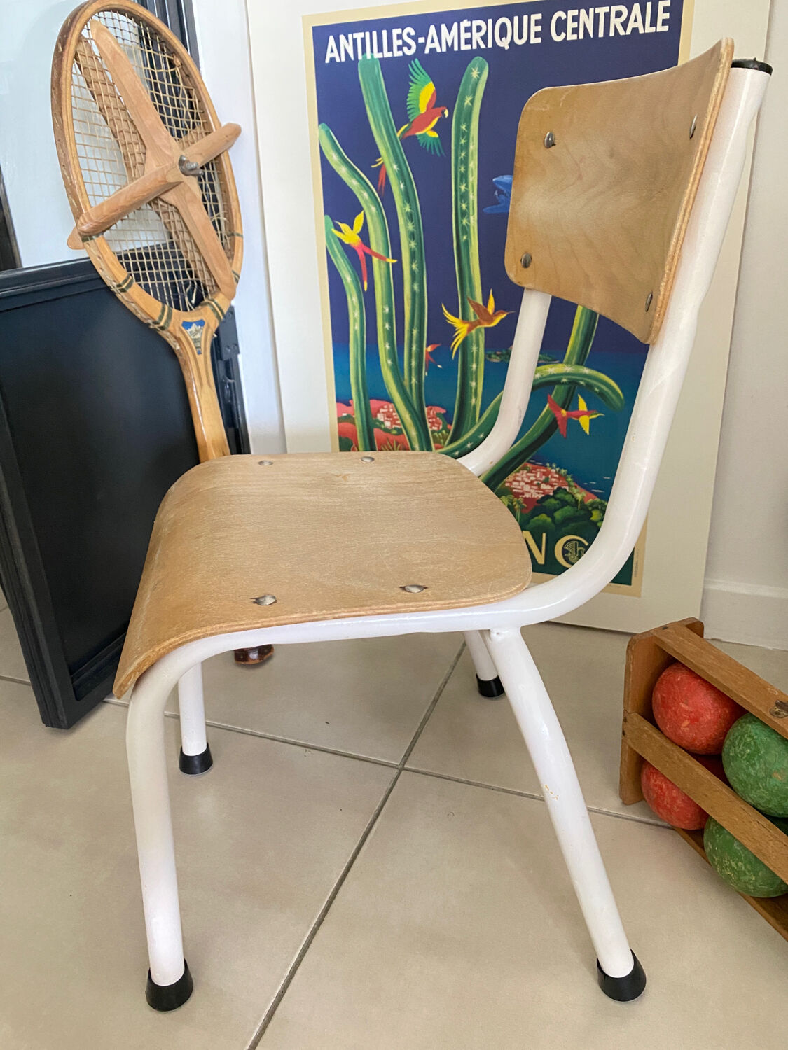 Old wooden and metal children's school chair