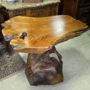 Sculpted olive wood table, made from a root.