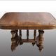 Extendable wheeled table henri ii, second half of the 19th century, solid walnut.