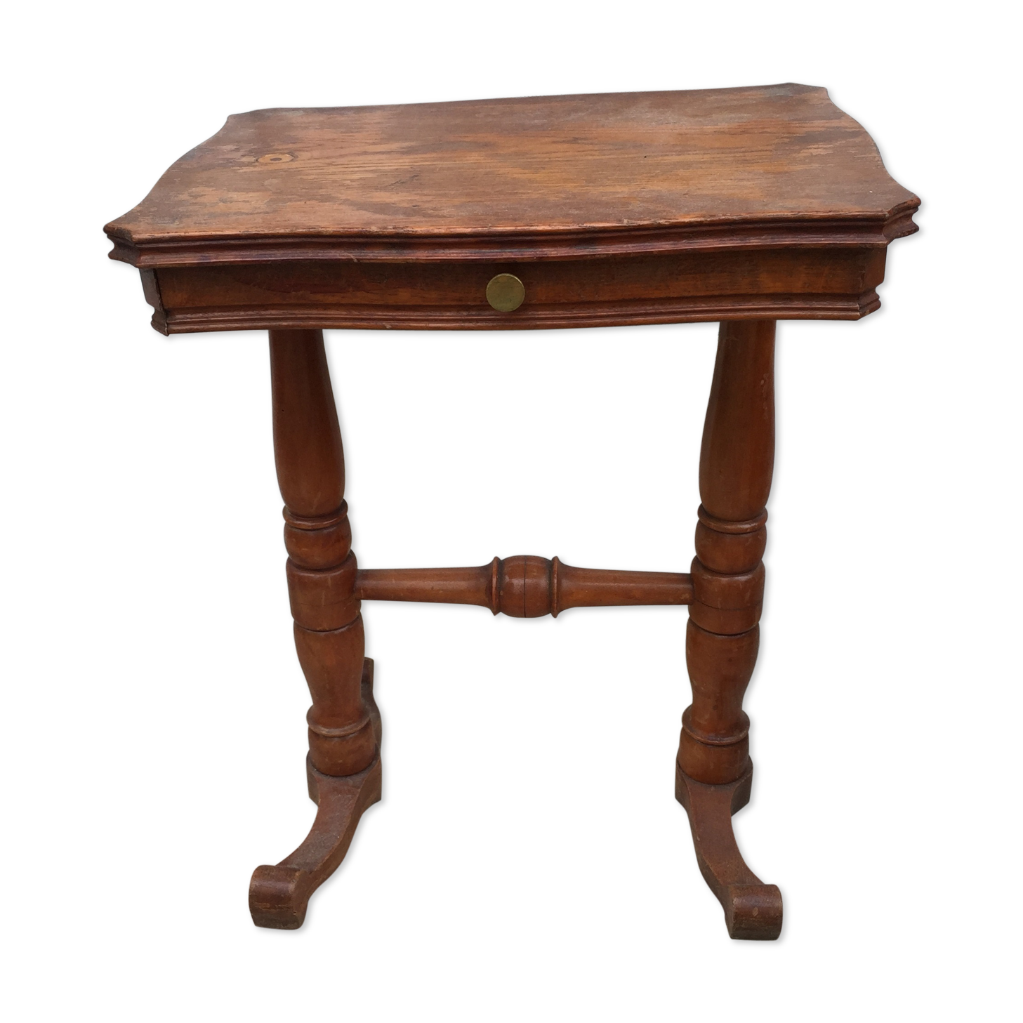 Old wooden sewing worker